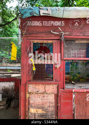 An old telephone booth on the streets of Chennai, India. Stock Photo