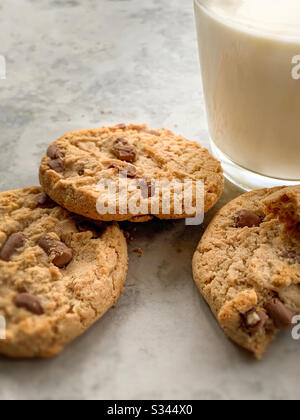 Milk and cookies close up shot.  Macro of chocolate chips Stock Photo
