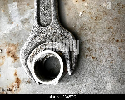 Large spanner with nut Stock Photo