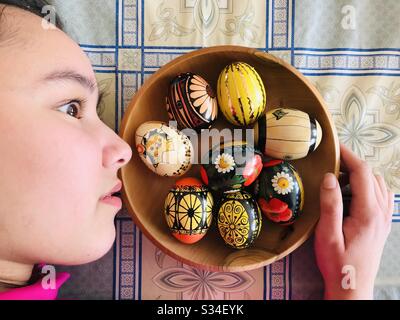 Girl with Painted Eggs Stock Photo