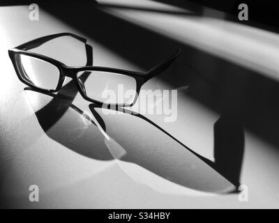 Glasses in the Light and Shadow Stock Photo