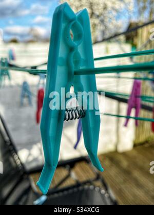 Clothes pegs on a washing line Stock Photo