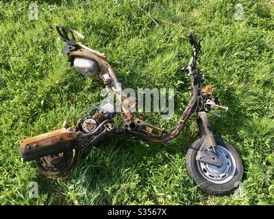 Burnt out scooter Stock Photo - Alamy