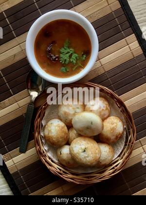 Homemade breakfast dish Appe and Sambar. This is of the most popular South Indian snacks for breakfast in India. Stock Photo