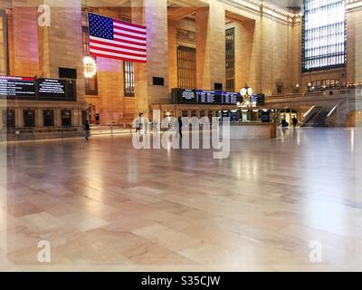 The grand concourse of Grand Central terminal is nearly deserted due to sanctions brought on by the COVID-19 pandemic, April 2020, NYC, USA Stock Photo