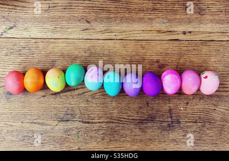 Dyed Easter eggs lined up in rainbow order Stock Photo