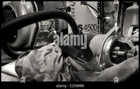 Testing an engine starter motor, with the generator in the background, Catalonia, Spain. Stock Photo