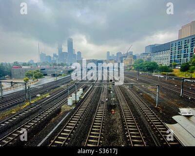 Train tracks leading into downtown Melbourne, Australia Stock Photo
