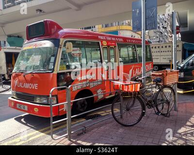 Red minibuses in Mongkok, Hong Kong. Stock Photo