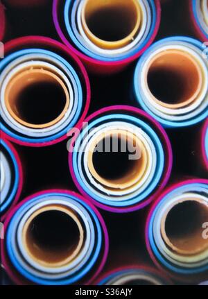 Hair curlers for hair styling graphic design arrangement circles vibrant colors looking down Stock Photo