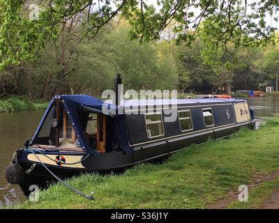 The Hideaway - Narrowboat moored on River Wey near Ripley, Surrey, UK. Stock Photo