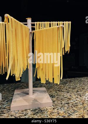 Pasta drying rack hi-res stock photography and images - Alamy