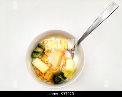 Cornflakes with exotic fruits Stock Photo