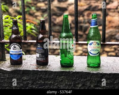 Download Four Green Glass Bottles Of Beer On Dark Lighted Background Close Up Stock Photo Alamy Yellowimages Mockups