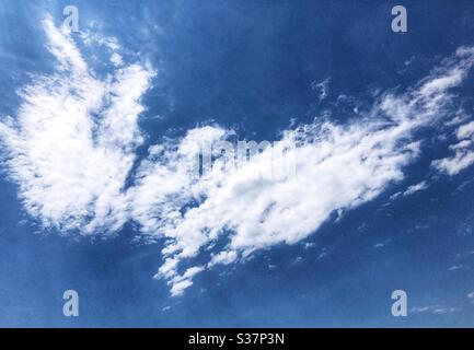 Angel wings cloud formation in the sky. Stock Photo