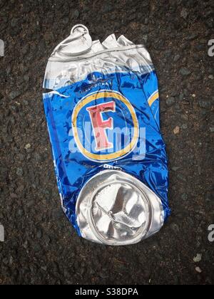 Crushed foster’s beer can Stock Photo