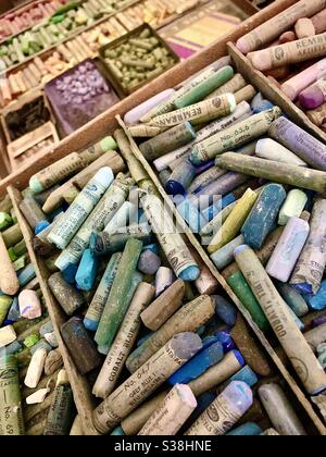 Selection of old artist’s pastel crayons. Stock Photo