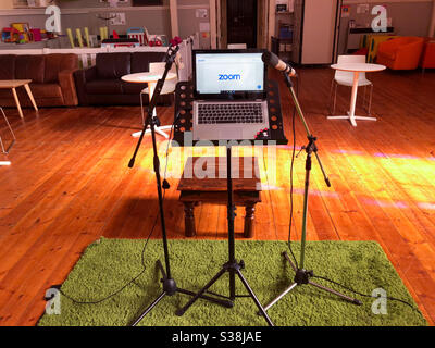 Computer and microphones set up on a church to do a service via video conference. Stock Photo