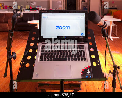 Computer and microphones set up on a church to do a service via video conference. Stock Photo