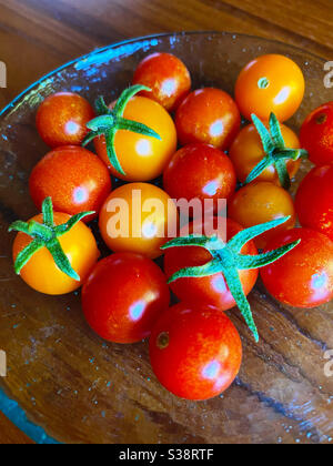 Cherry tomatoes in a glass dish, closeup Stock Photo