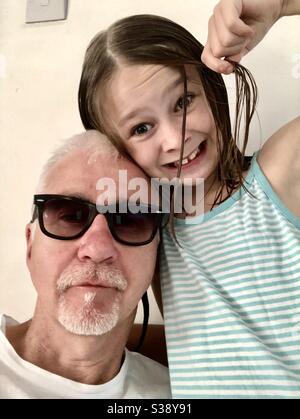 Funny selfie of dad and daughter Stock Photo - Alamy