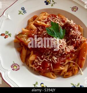Mini Penne Pasta with homemade meatballs and Sunday tomato sauce Stock Photo