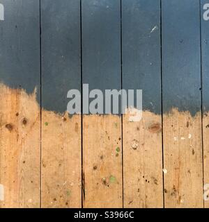 Half painted floorboards Stock Photo