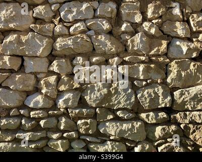 Random stone wall detail. Stock Photo