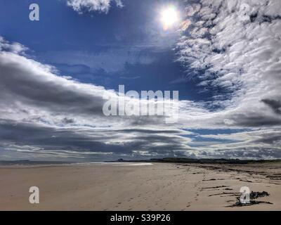 Bamburgh Castle from Rock Back Sands Northumberland Stock Photo