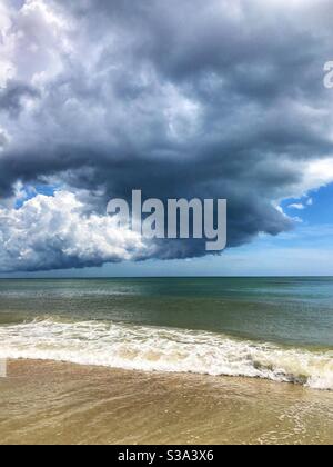 Summer thunderstorm rolling out over the ocean, Jacksonville Beach, Florida Stock Photo