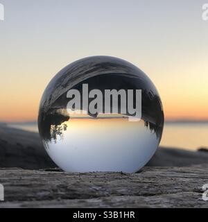 sunset in glass orb Stock Photo