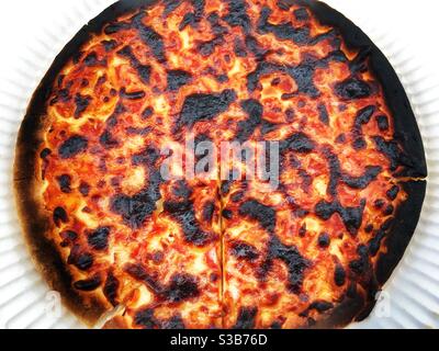 Burnt pizza Stock Photo