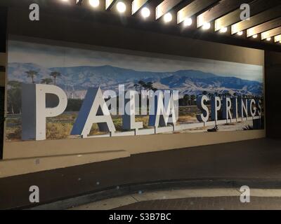 Palm Springs, USA. 13th Nov, 2020. A outdoor Palm Springs sign early in the night downtown, a famous selfie spot for travelers. Stock Photo