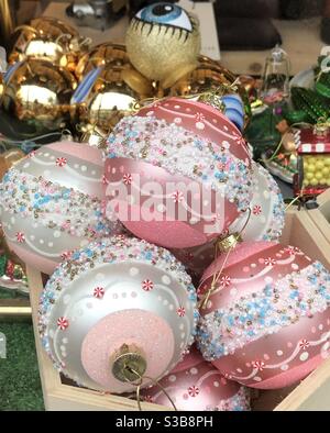 Christmas baubles in a London boutique window Stock Photo