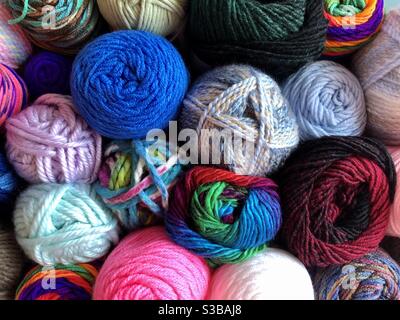 Premium Photo  Colorful yarns of wool for knitting on shelves in the  haberdashery shop knitwork handcraft concept