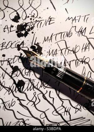 Fountain pen on a sheet of paper. Close up Stock Photo