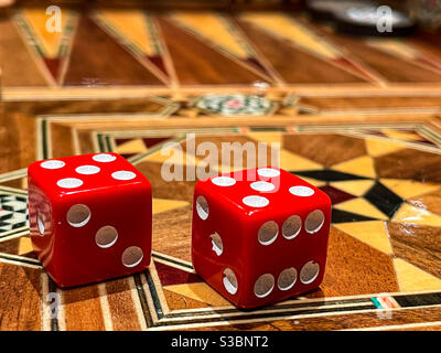 Close up of dice on a back gammon board Stock Photo