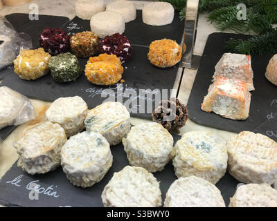 Plate with goat cheese in food market in France Stock Photo