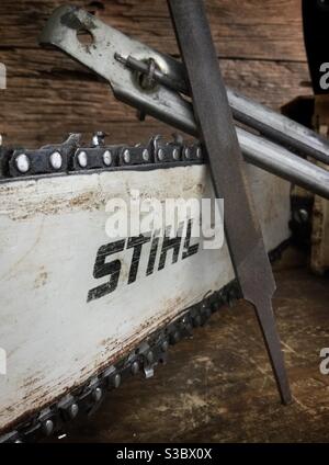 Sharpening a Stihl chainsaw with files, Catalonia, Spain. Stock Photo