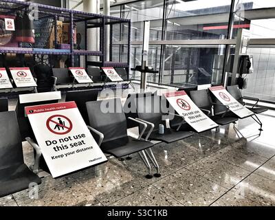 Heathrow Airport T2 - socially distanced seating due to COVID-19 Stock Photo