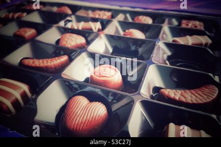 A close up photograph of a box of Cadbury milk tray chocolates Stock Photo