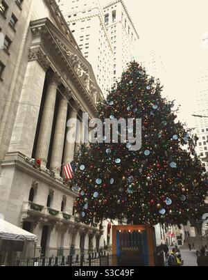 The New York Stock Exchange celebrates the holidays with a huge Christmas tree each year, NYC, USA Stock Photo