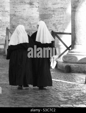 Black and white photo of two nuns in Rome Italy Stock Photo