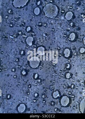 Abstract oil and water bubbles on blue background Stock Photo