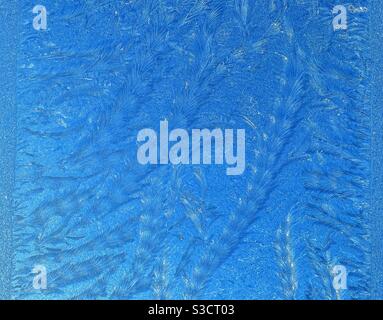 Pattern formed by ice crystals from heavy frost on a window Stock Photo