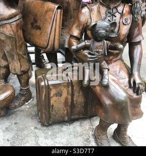 Detail from the poignant Kindertransport Memorial Statue- The Arrival- outside Liverpool Street railway station, London. Created by the artist Frank Meisler Stock Photo