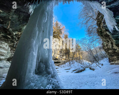 Behind the frozen waterfall. LaSalle Canyon, Starved Rock State Park, Illinois. Stock Photo