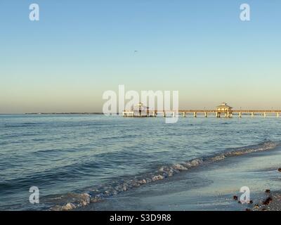 Beautiful pier during sunrise in Fort Myers Beach Florida Stock Photo