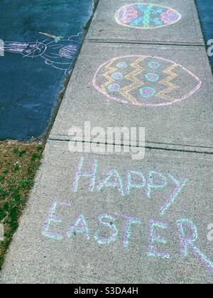 Happy Easter written on sidewalk during lockdown 2020 Stock Photo