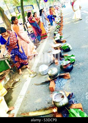 Attukal Pongala- An annual festival in Trivandrun,kerela where only women participate and prepare a special dish on the roadside called Pongala to be offered to diety. Millions of women participate . Stock Photo